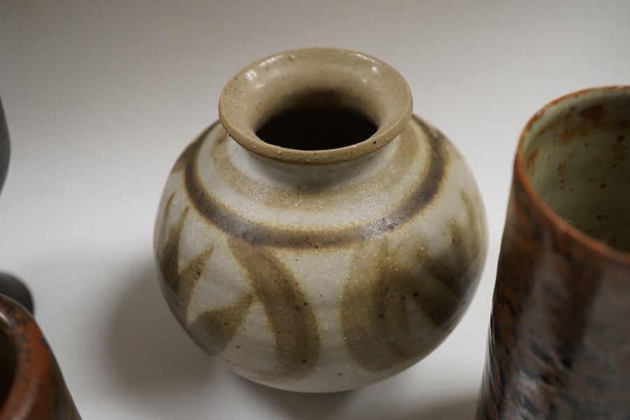Assorted studio pottery comprising six vases and a goblet, largest 15cm high